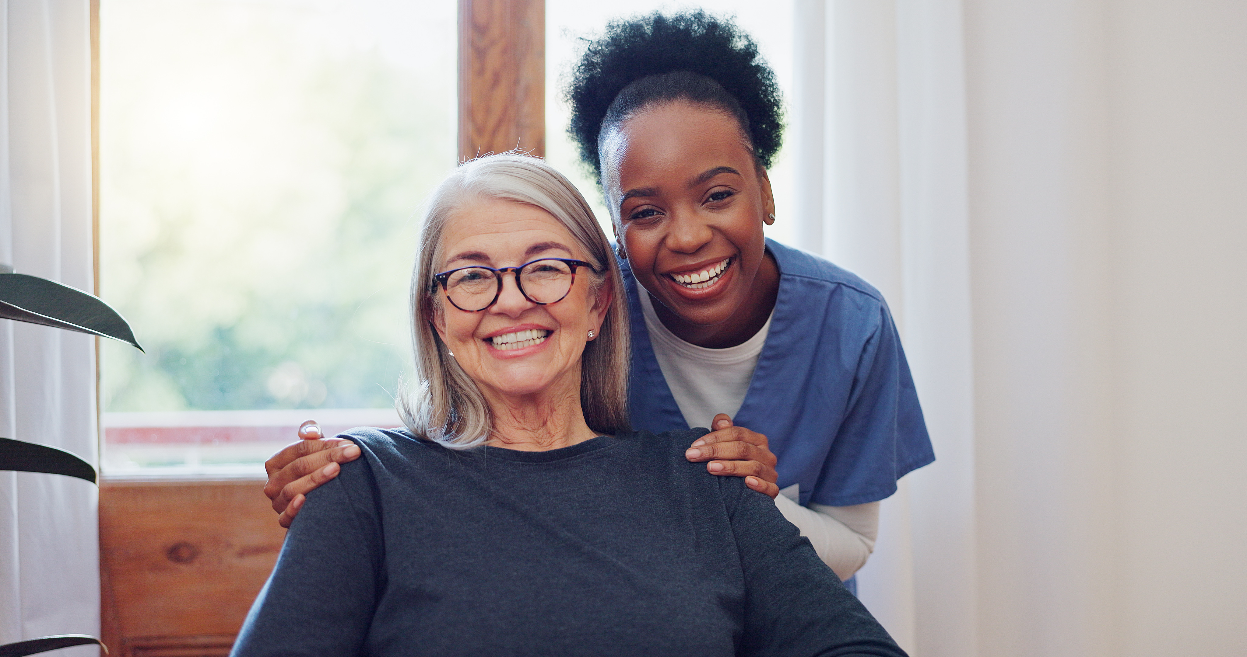 Medical aide consulting with patient